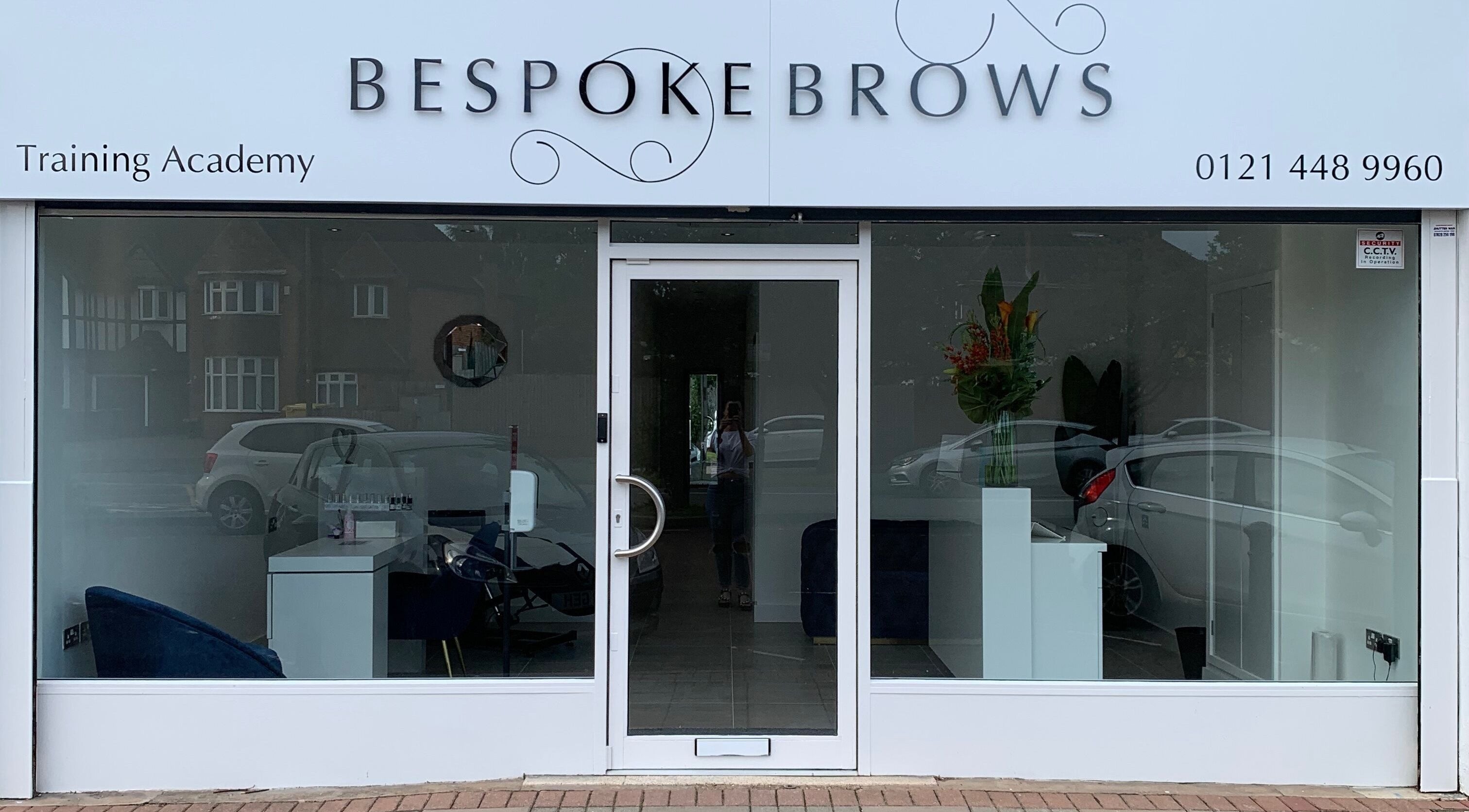 Front view of Bespoke Brows & Aesthetics in Shirley, England, GB, showcasing its modern glass façade.