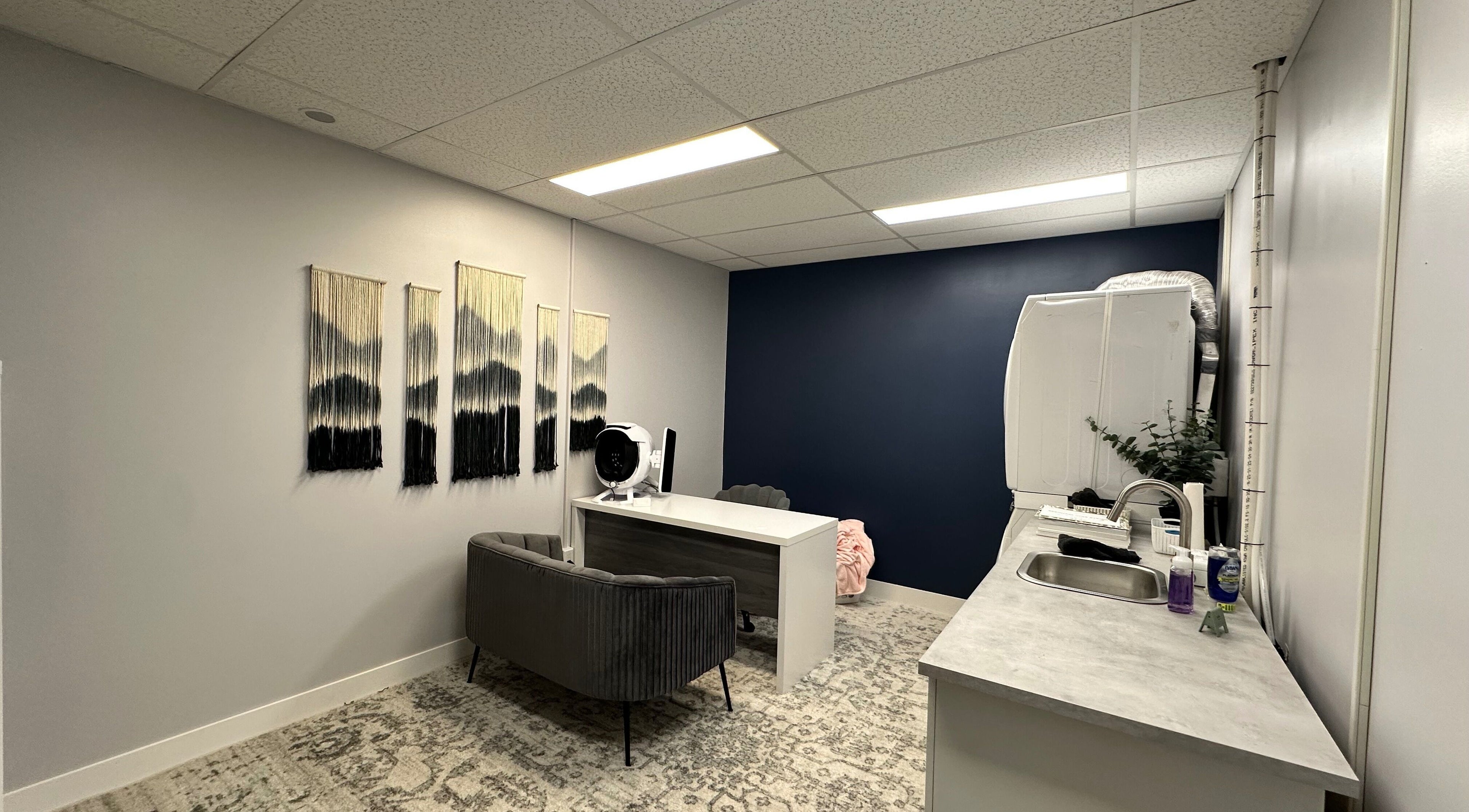 Spa room at Radiate Skin Wellness in Whitecourt, Alberta, CA with elegant decor and modern facilities.