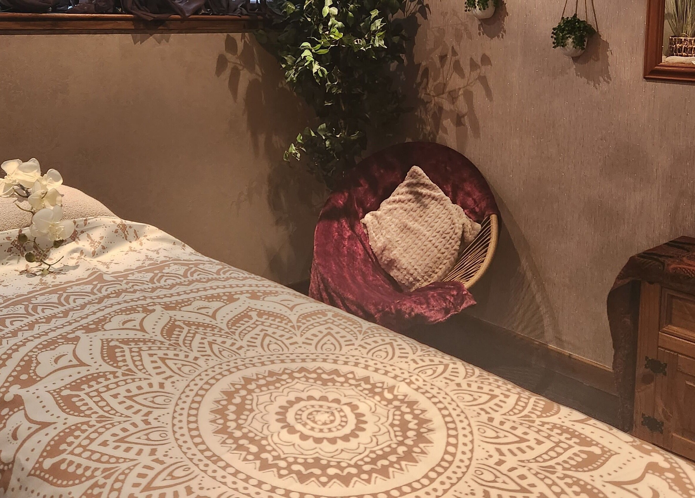 Tranquil massage room at Orchids Spa and Beauty training Ltd, Stourport-on-Severn, England, GB with elegant decor.