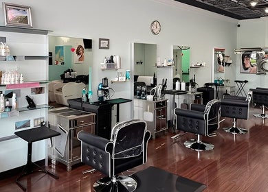 Modern styling chairs and product shelves at MaryLuz Hair Salon in Jupiter, Florida, US.