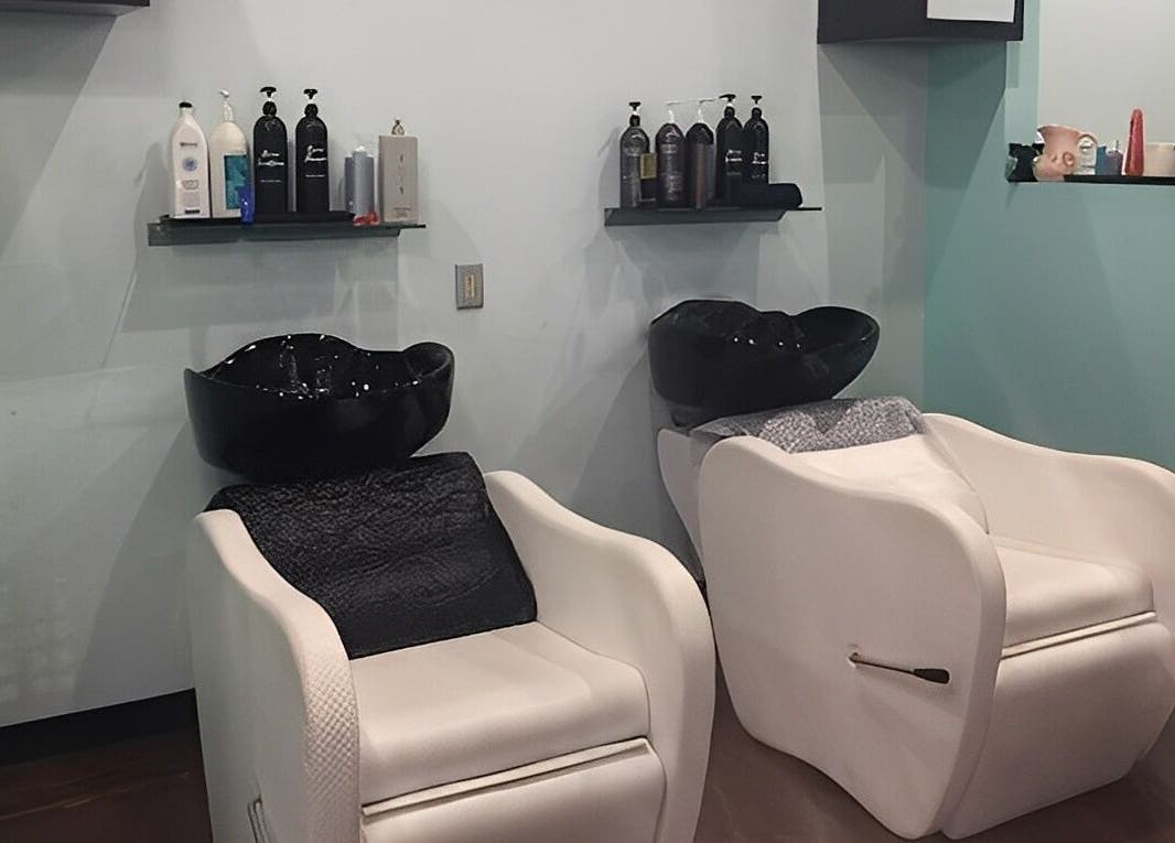 Elegant shampoo station at MaryLuz Hair Salon in Jupiter, Florida, US, showcasing modern hair washing chairs and products.