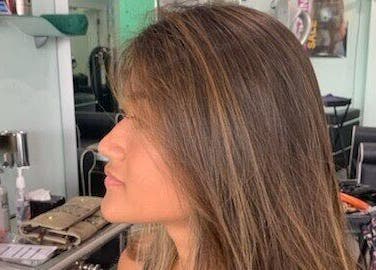 Client showcasing textured hairstyle at MaryLuz Hair Salon, Jupiter, Florida, US.