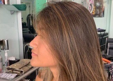 Client showcasing textured hairstyle at MaryLuz Hair Salon, Jupiter, Florida, US.