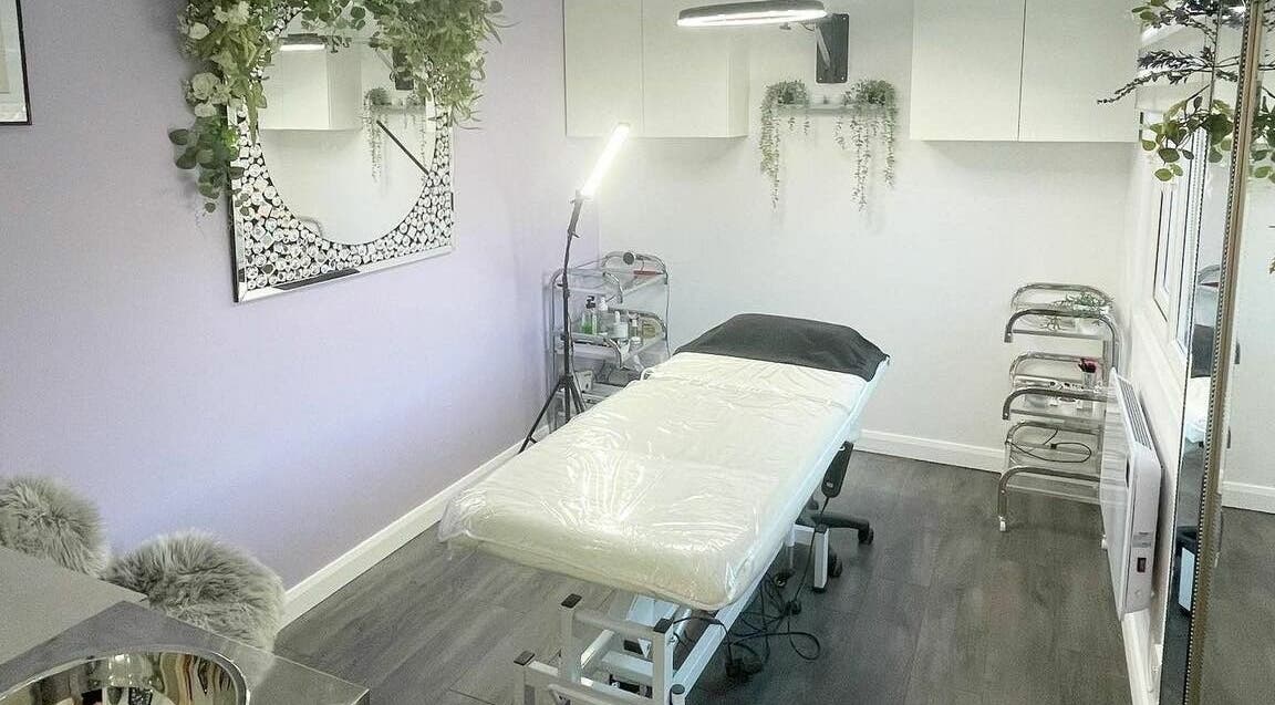 Sleek treatment room at The Little Grey Box Ltd, Ashford, England, GB with elegant decor and relaxing ambiance.