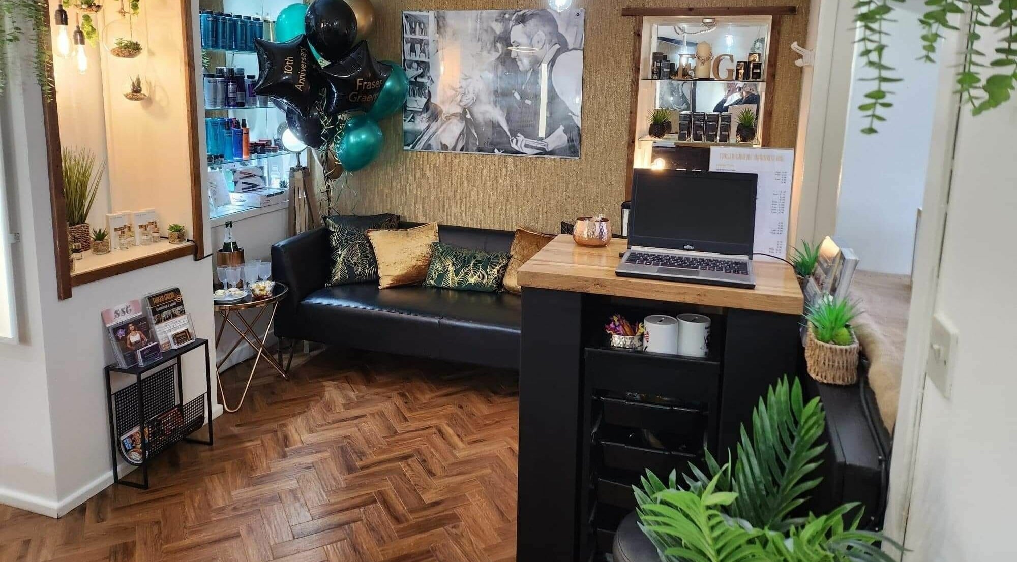 Chic salon interior of Fraser Graeme Hairdressing and Barber Invergowrie Dundee in Invergowrie, Scotland, GB.