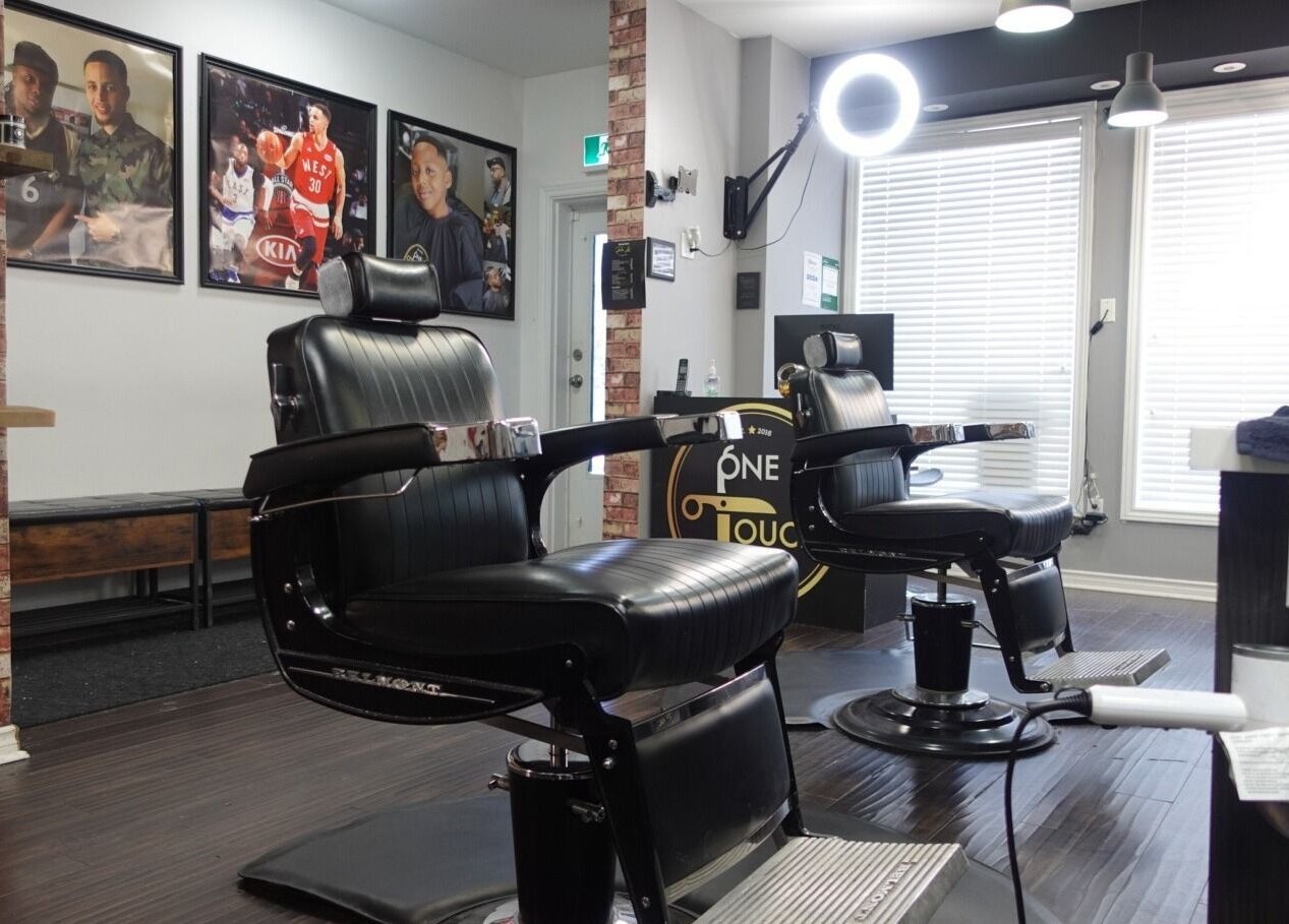 Sleek barber chairs at One Touch Barbers Inc, Markham, Ontario, CA offering premium grooming services.