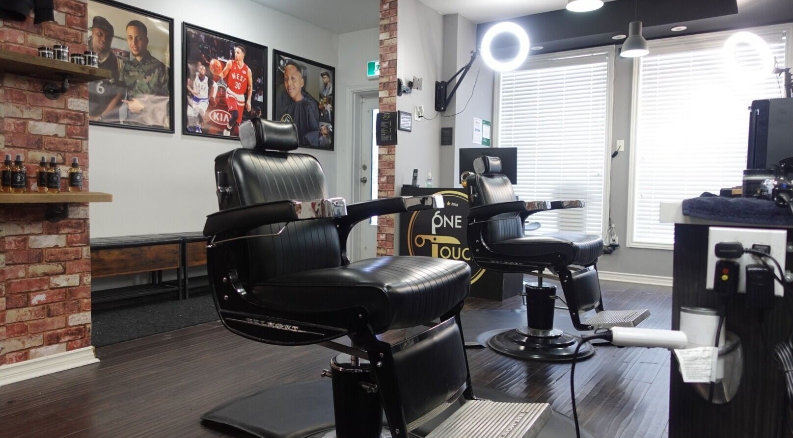 Sleek barber chairs at One Touch Barbers Inc, Markham, Ontario, CA offering premium grooming services.