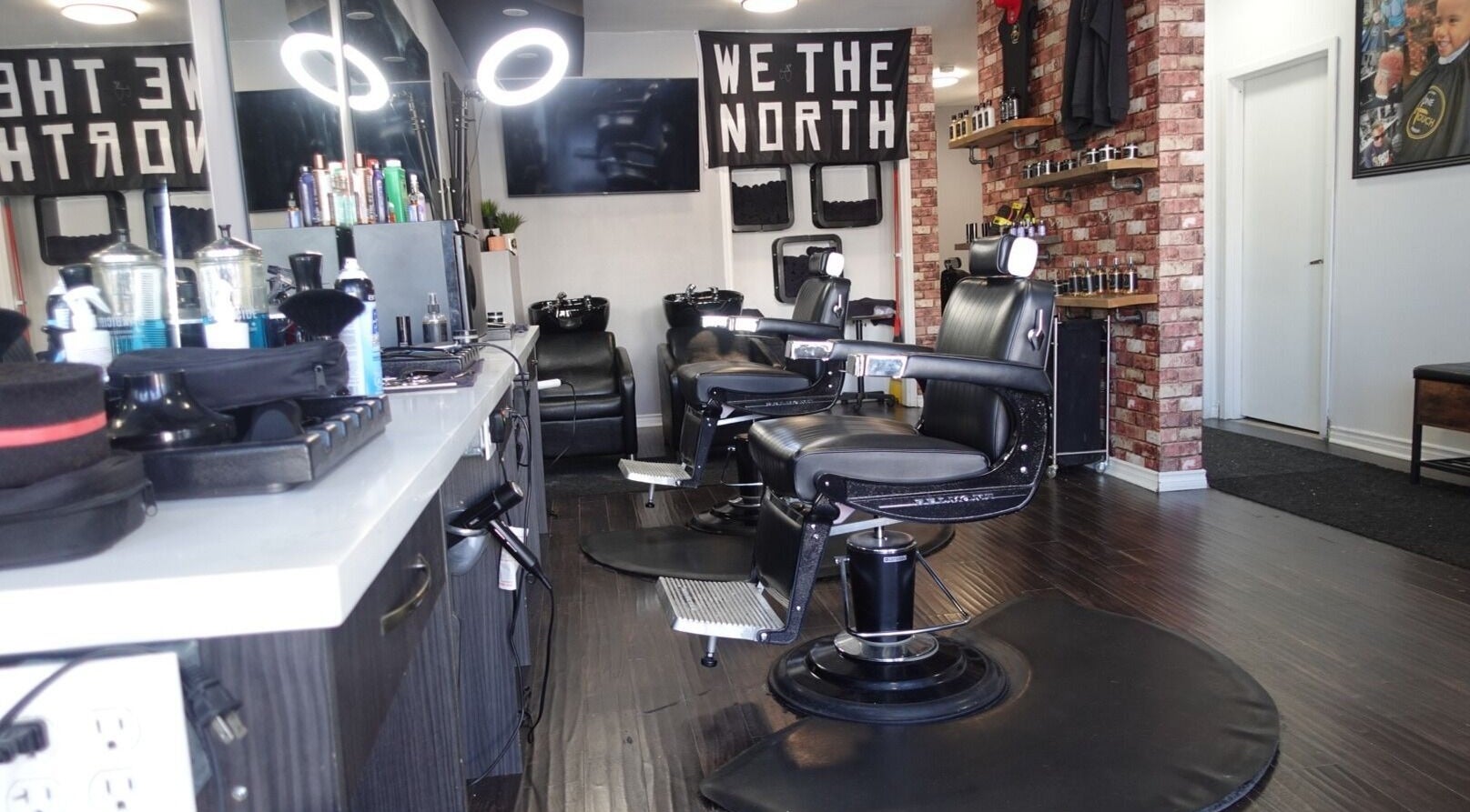 Modern barber chairs at One Touch Barbers Inc, Markham, Ontario, CA. A sleek and stylish grooming space.