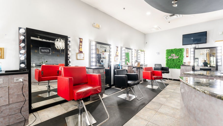 Modern salon interior at Hair in Motion of New York - MetroWest, Orlando, Florida, US with stylish decor.