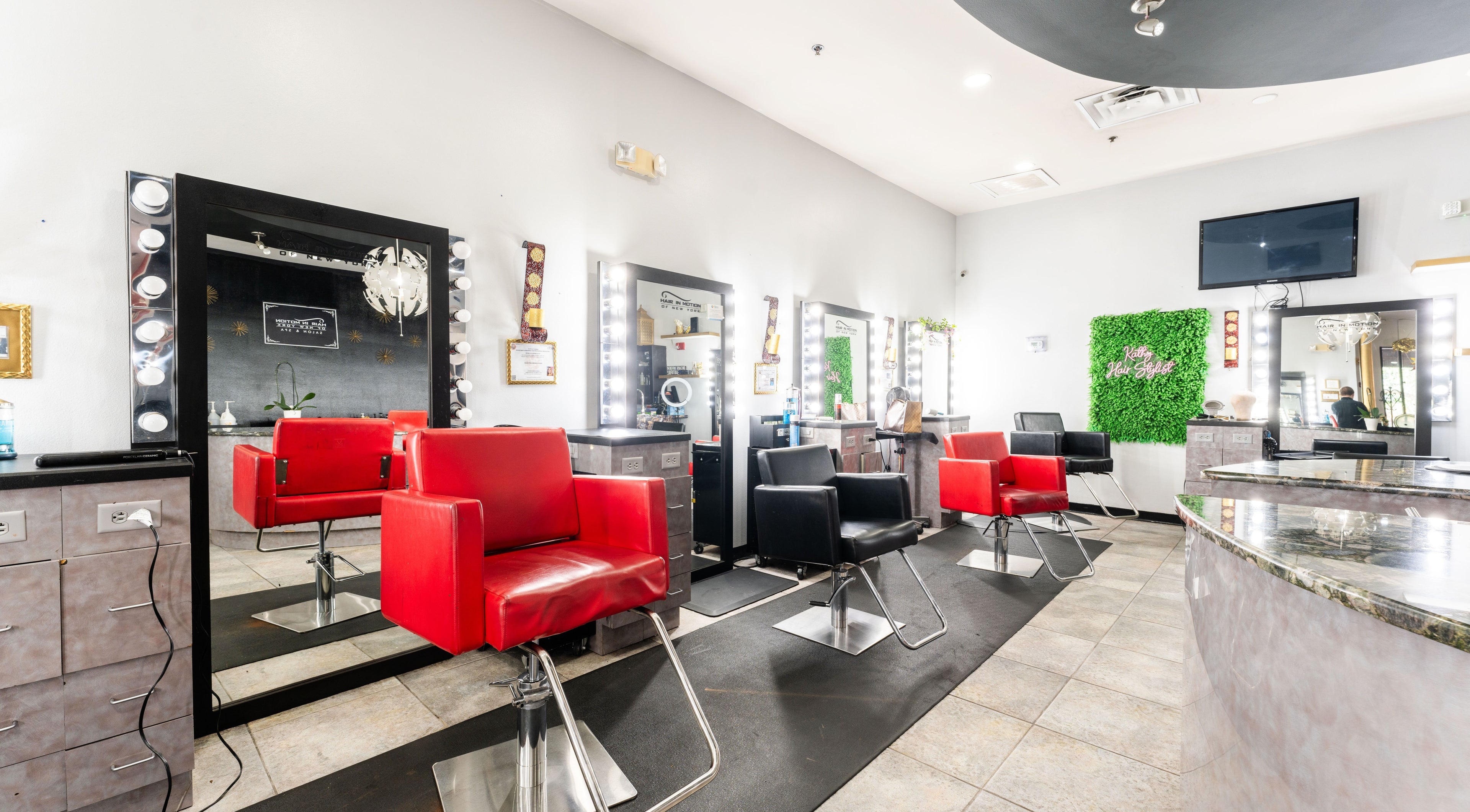 Modern salon interior at Hair in Motion of New York - MetroWest, Orlando, Florida, US with stylish decor.