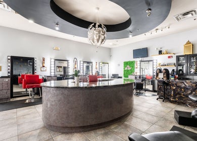 Elegant interior of Hair in Motion of New York - MetroWest, located in Orlando, Florida, US, featuring stylish decor.