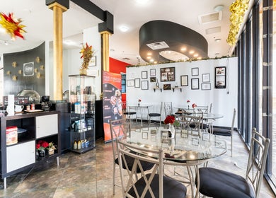 Interior of Hair in Motion of New York - MetroWest, Orlando, Florida, US. Elegant seating and decor.