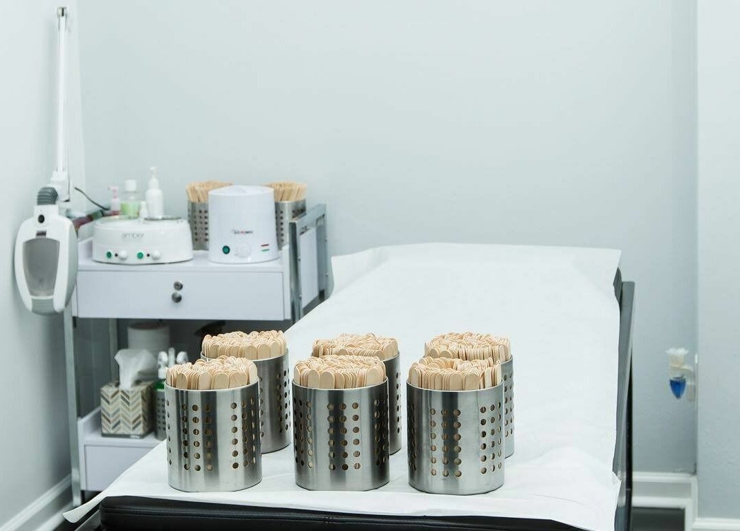 Braziliant Body Waxing treatment room in Ridgefield, Connecticut, displaying waxing tools and table setup.