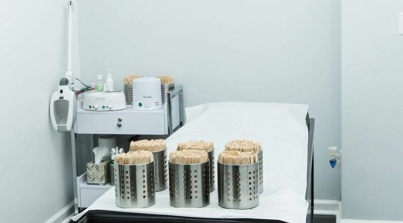 Braziliant Body Waxing treatment room in Ridgefield, Connecticut, displaying waxing tools and table setup.