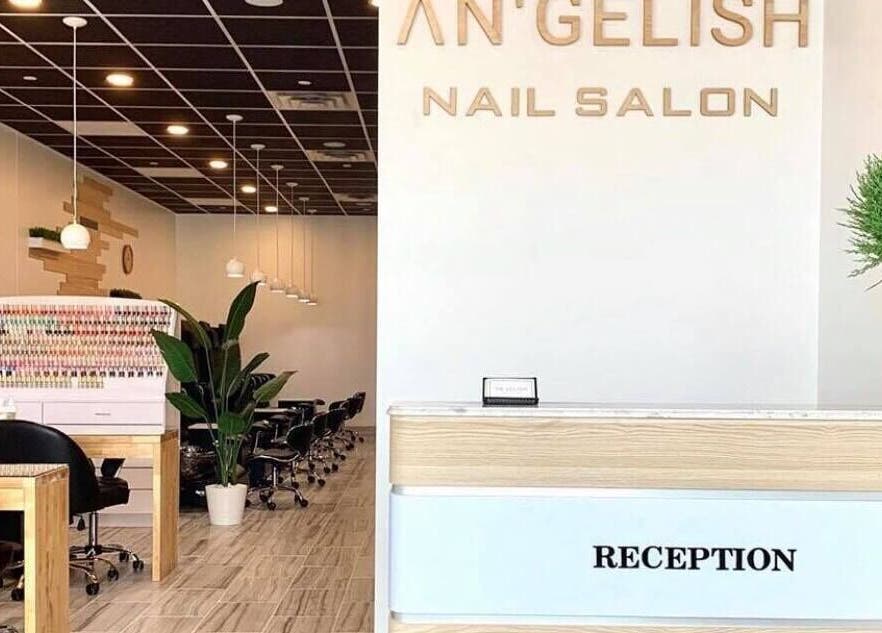 Reception area of ANGELISH NAIL SALON, Lake Elmo, Minnesota, US with stylish decor and nail polish display.