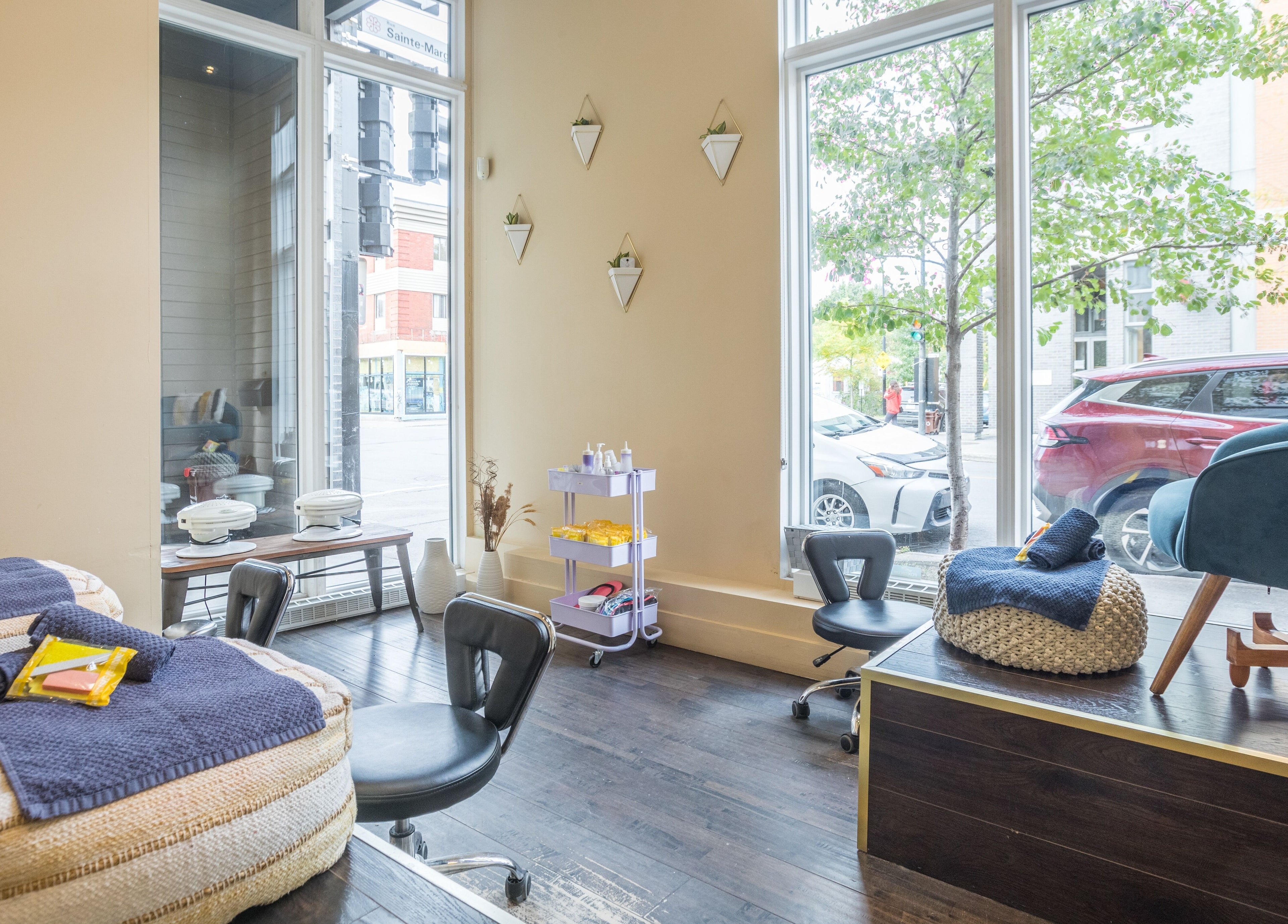 Inviting pedicure area at V and O Salon, Montréal, Québec. Natural light enhances relaxing vibe.