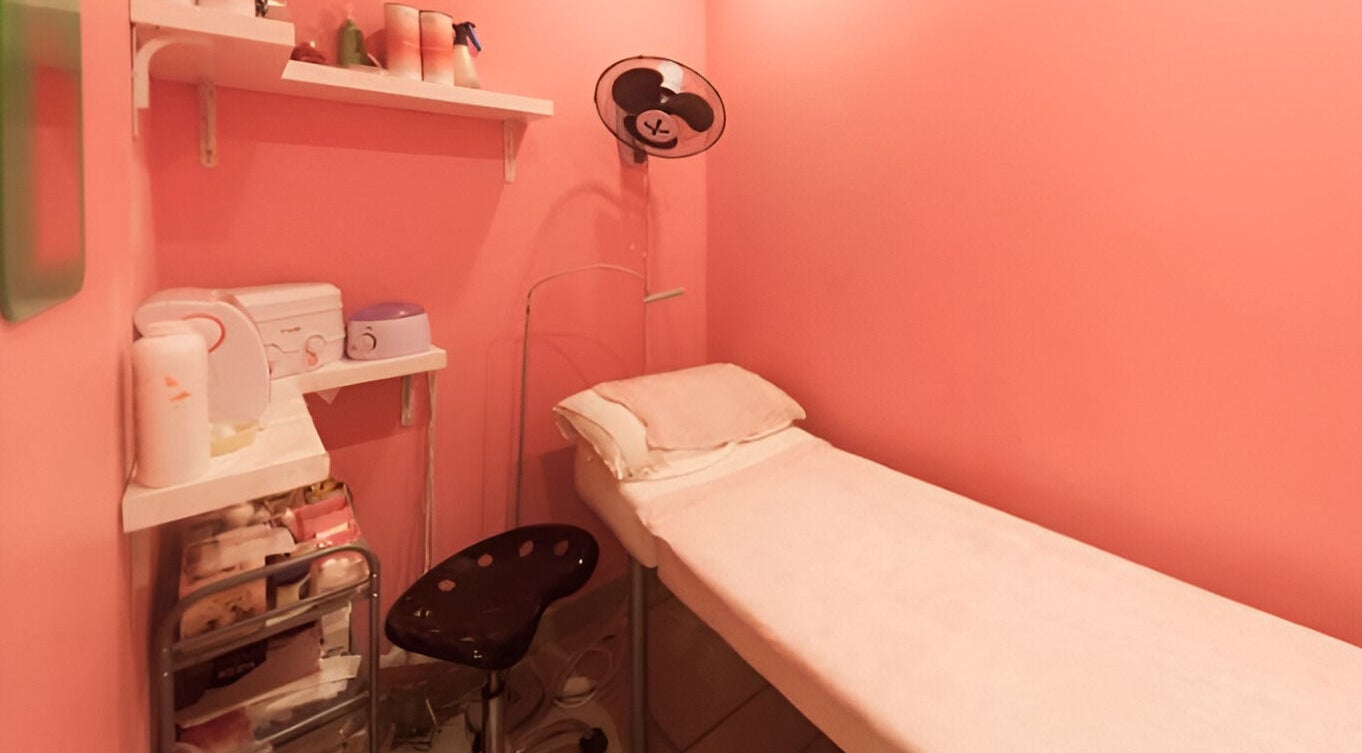 Cozy pink treatment room at YF Beauty and Nails, Lane Cove, New South Wales, AU, ready for relaxation.