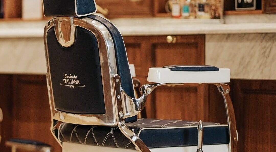 Elegant barber chair at Barberia Italiana - Mercato Shopping Mall, Dubai, AE.