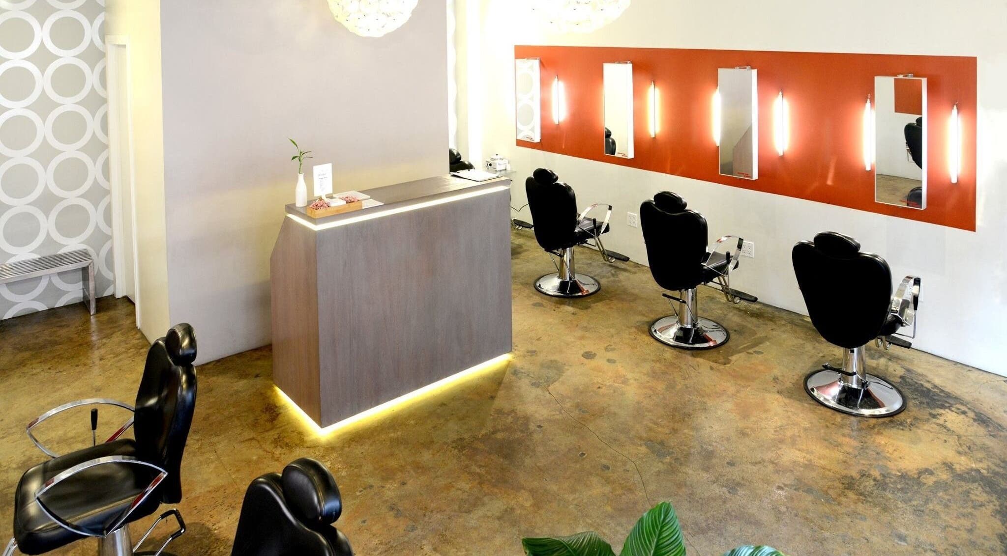 Modern salon interior at Thread - Murray Hill in New York, New York, US with stylish design and chic seating.