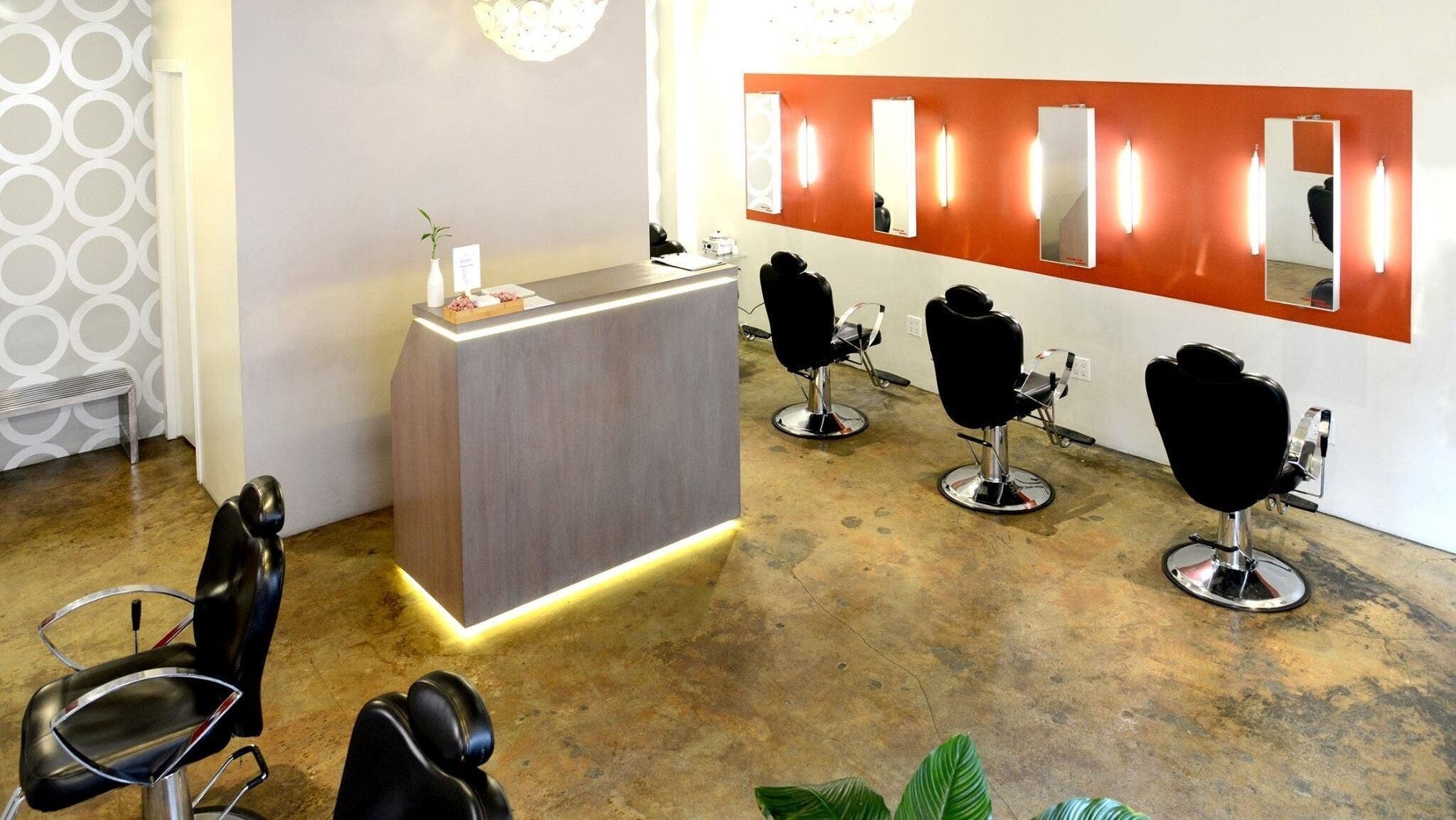 Modern salon interior at Thread - Murray Hill in New York, New York, US with stylish design and chic seating.