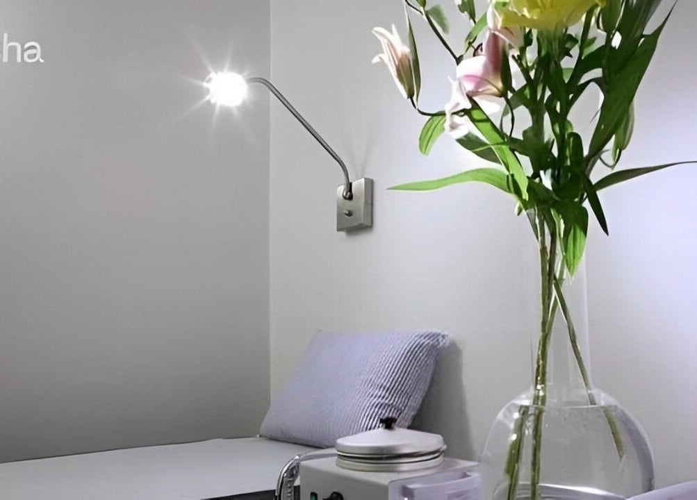 Relaxing treatment room with flowers at Thread - Financial District, New York, New York, US.