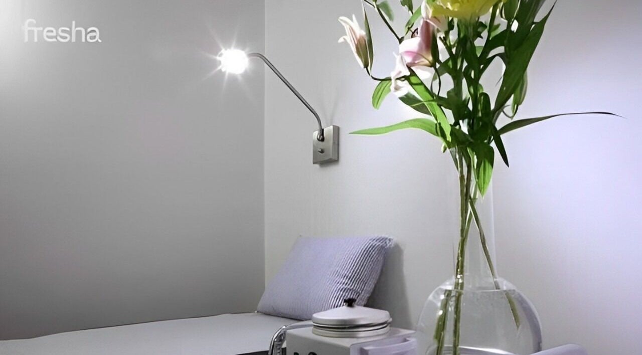 Relaxing treatment room with flowers at Thread - Financial District, New York, New York, US.