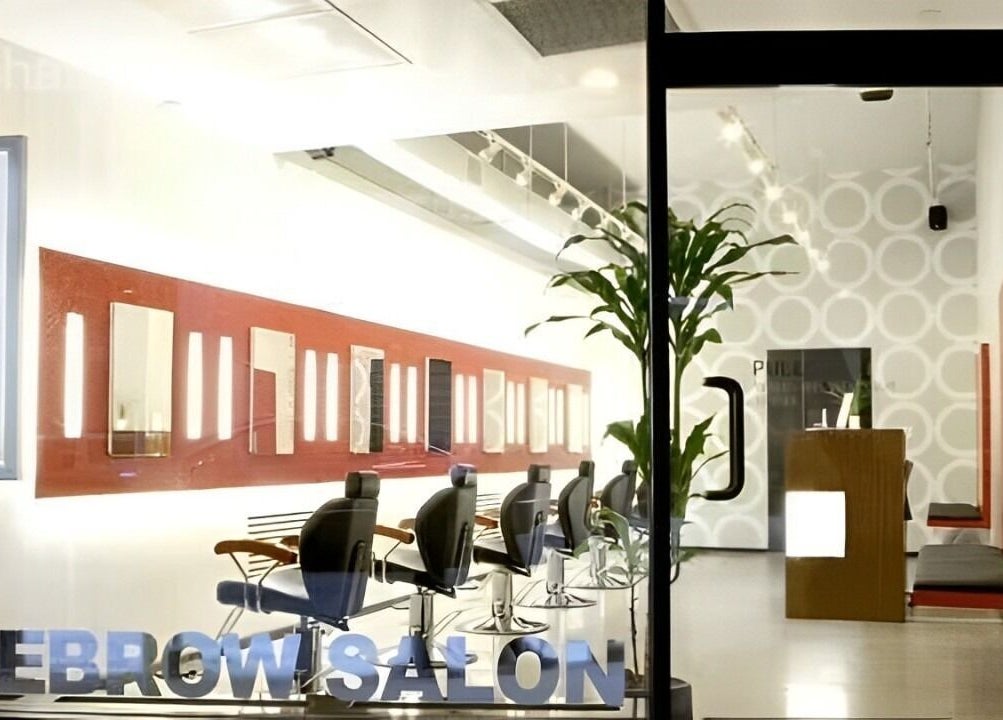 Stylish interior of Thread - Financial District, showcasing mirrors and chairs, New York, New York, US.