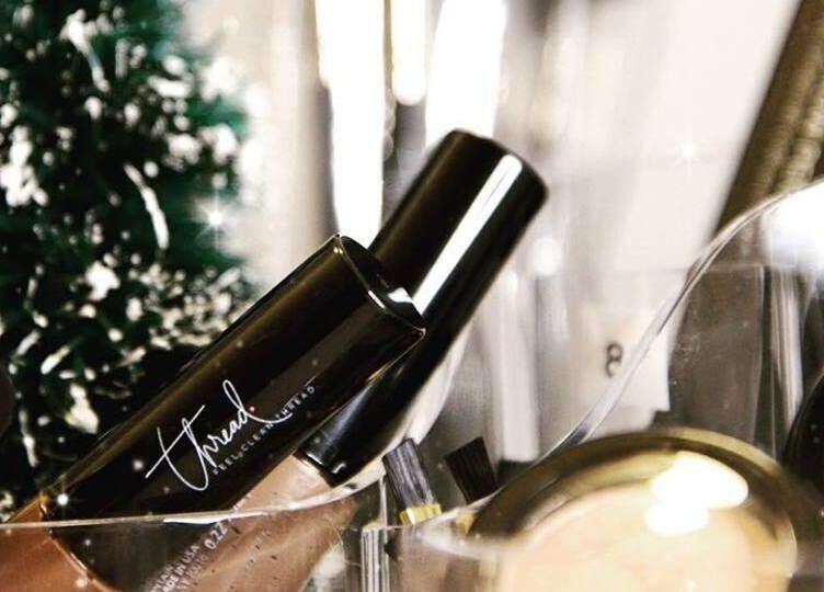 Close-up of beauty products at Thread - Financial District, New York, New York, US, showcasing makeup items.