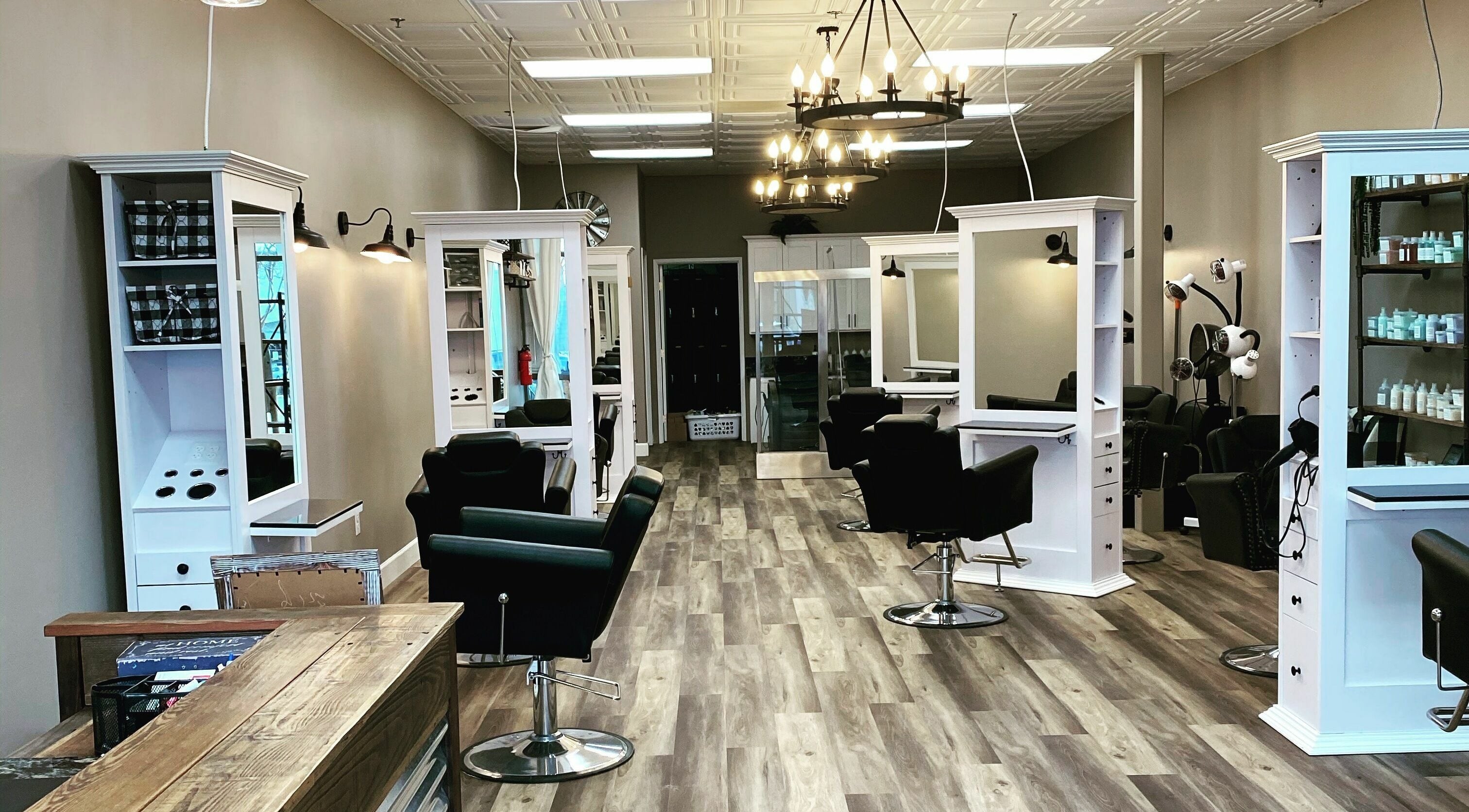 Modern salon interior at Bellabe Salon and Spa in Folsom, California, US, featuring sleek styling stations.