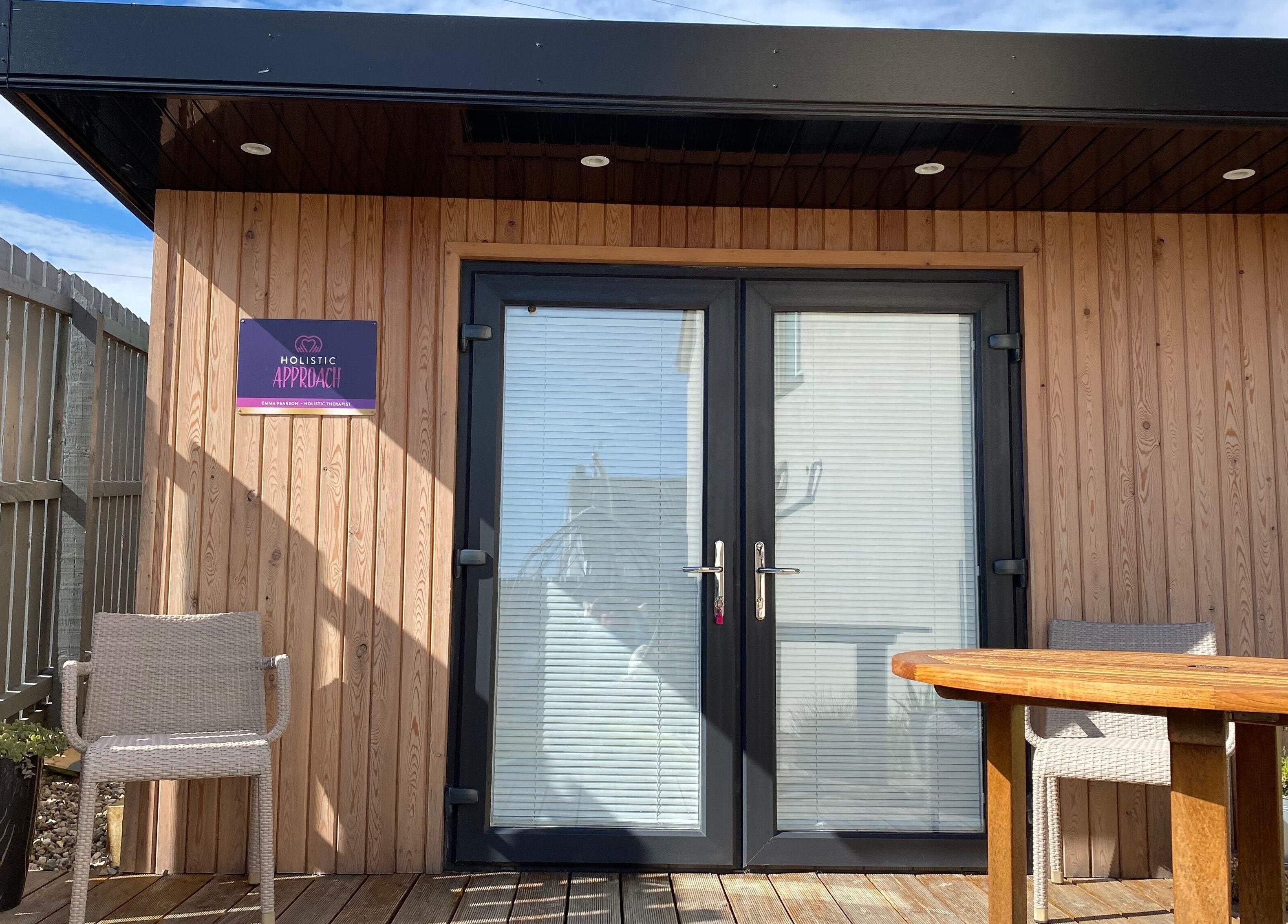 Entrance of Holistic Approach in Carrickfergus, Northern Ireland, GB featuring calm ambiance and natural wood decor.