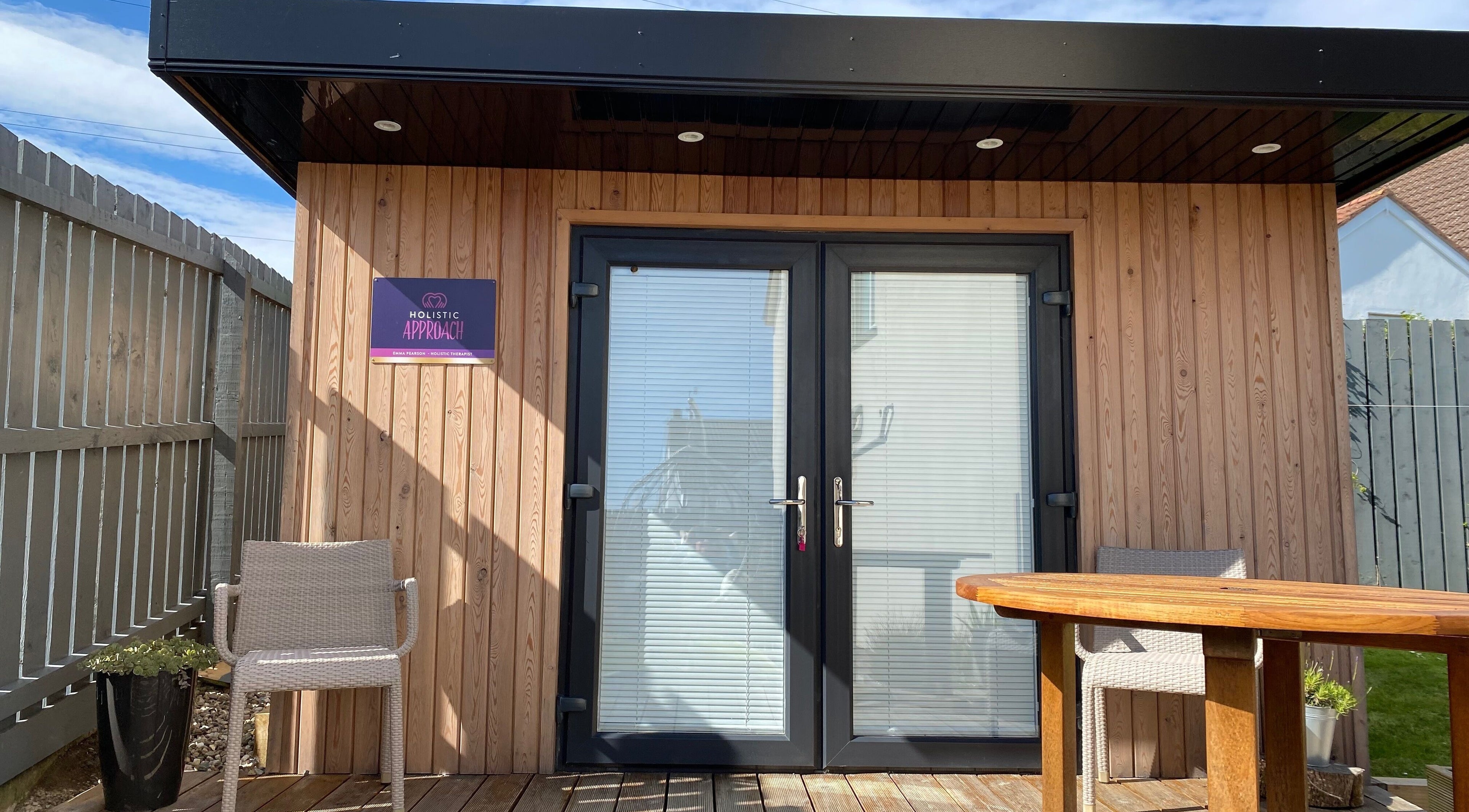 Entrance of Holistic Approach in Carrickfergus, Northern Ireland, GB featuring calm ambiance and natural wood decor.