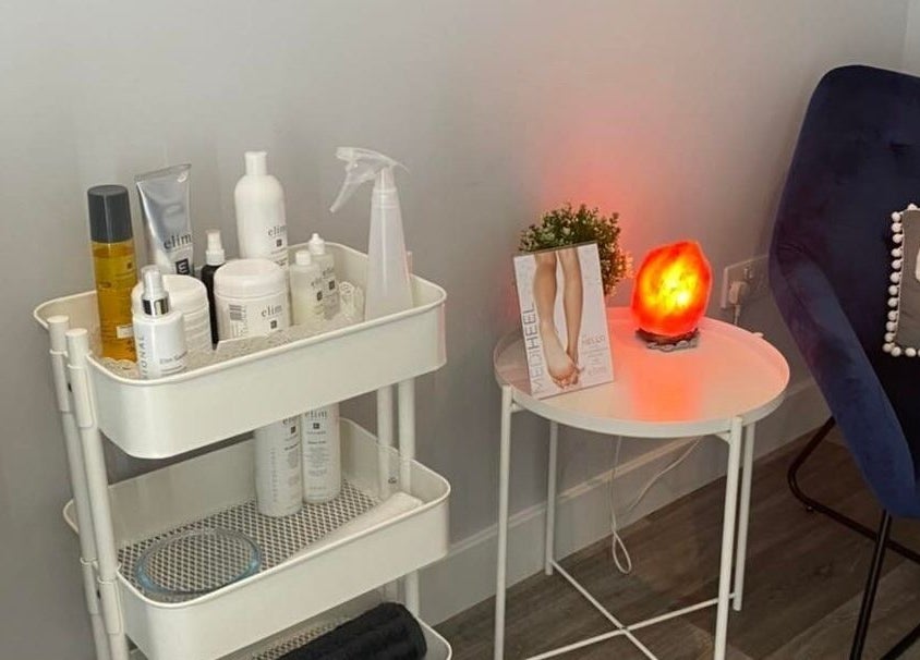 Relaxing corner at Holistic Approach, Carrickfergus, Northern Ireland, with skincare products and a Himalayan salt lamp.