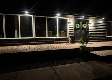 Beautiful evening view of Beauty Basics by Amy's exterior in Minden, Ontario, CA, warmly lit with elegant decor.