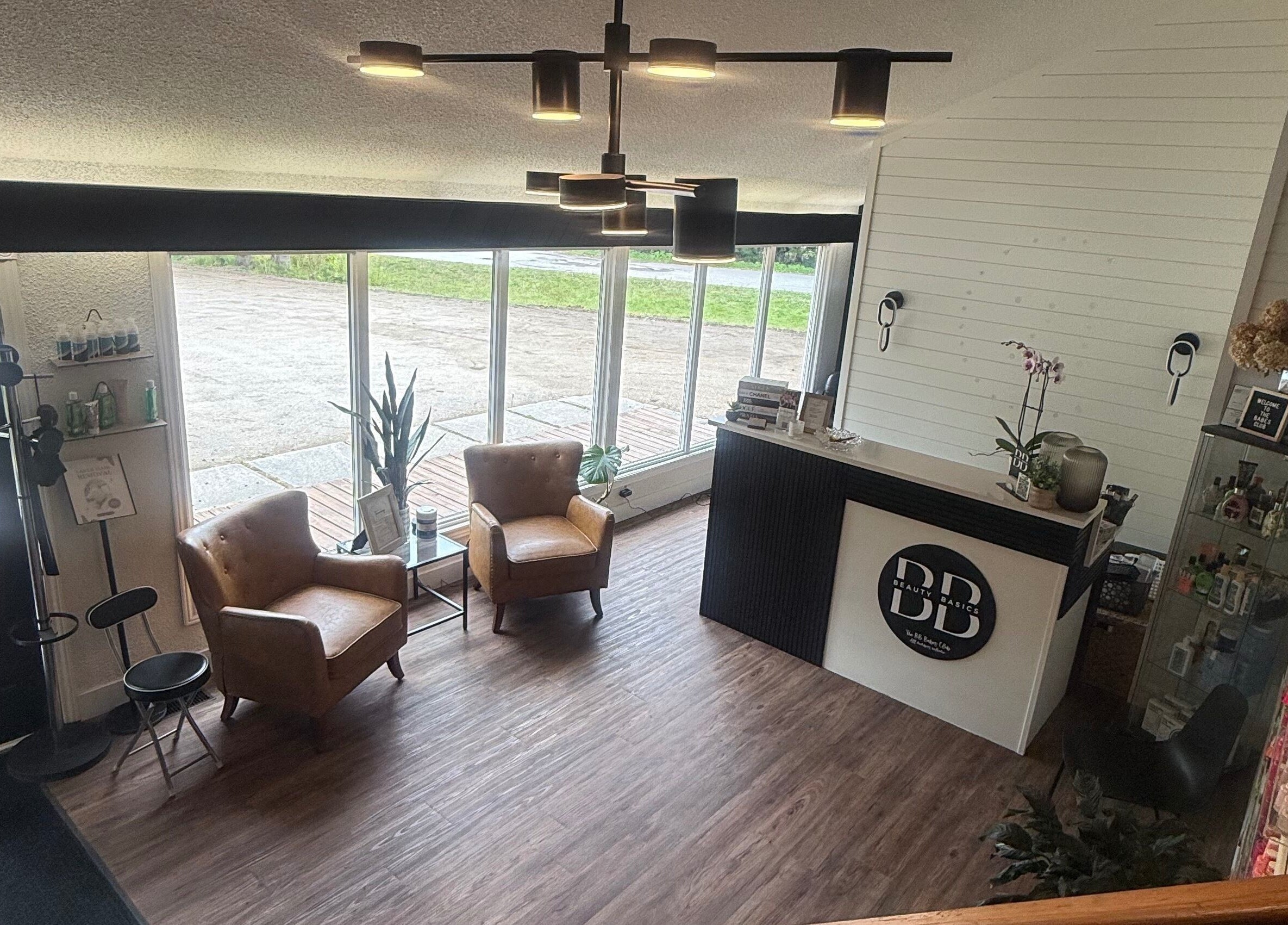 Elegant reception area at Beauty Basics by Amy, Minden, Ontario, CA, with chairs and decor.