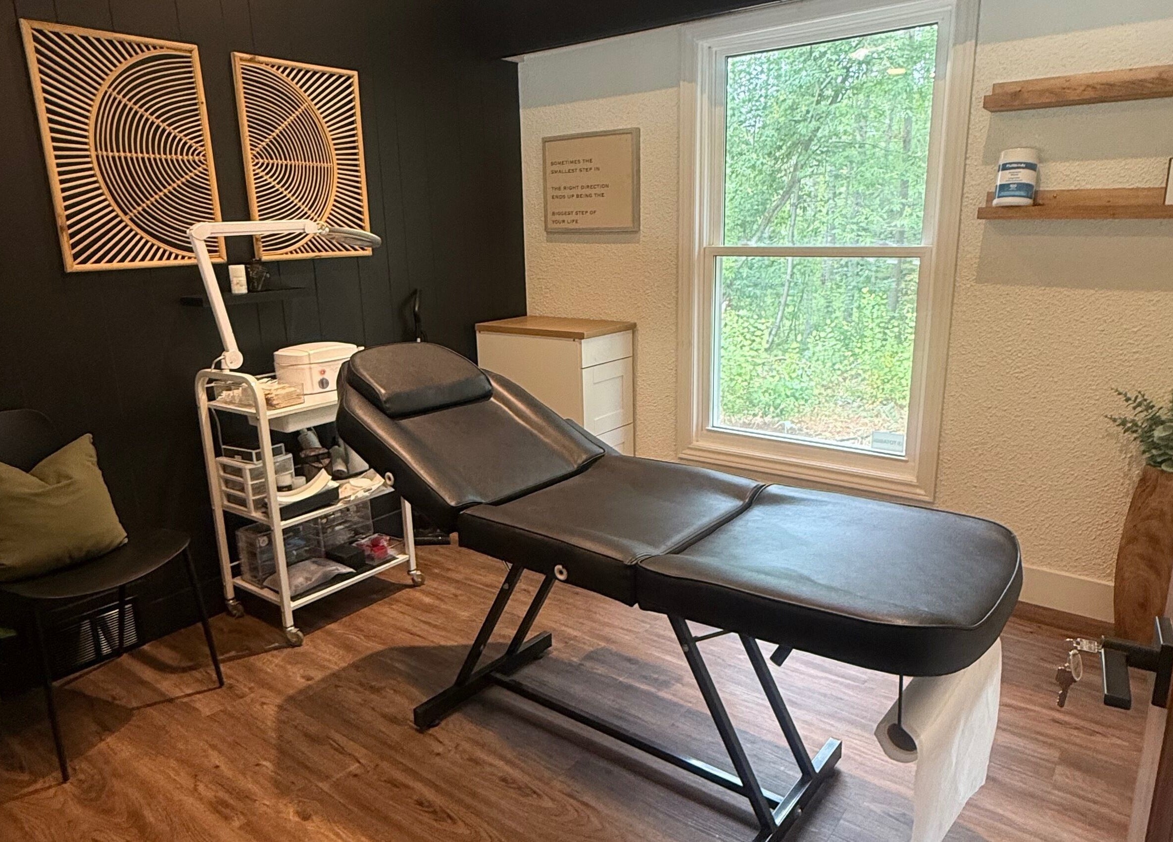 Cozy treatment room at Beauty Basics by Amy in Minden, Ontario, CA, featuring a comfortable massage bed.