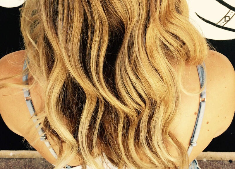 Blonde wavy hair at Hairs on Fire in Fremantle, Western Australia, AU.