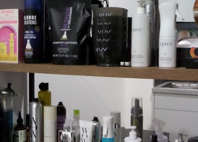 Beauty products neatly arranged at Zateesha Barbour, London, England, GB for hair care enthusiasts.