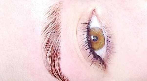 Close-up of expertly shaped eyebrow and eye at Donnas Beauty Therapy, Dereham, England, GB.