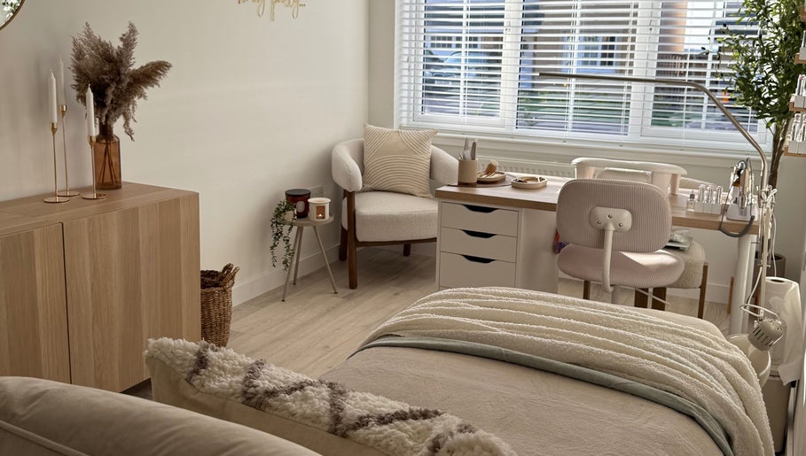 Relaxing treatment room at Sarah Lawson Beauty, Dalkeith, Scotland, GB with elegant decor and comfortable seating.
