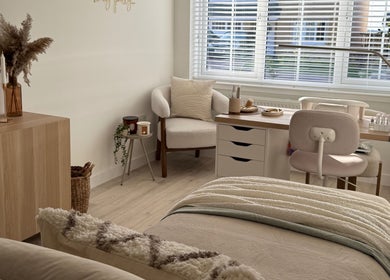 Relaxing treatment room at Sarah Lawson Beauty, Dalkeith, Scotland, GB with elegant decor and comfortable seating.