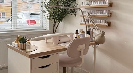 Manicure station at Sarah Lawson Beauty, Dalkeith, Scotland, GB with natural light and organized products.