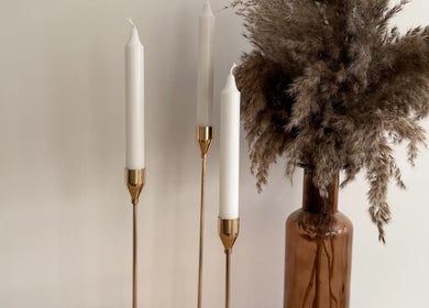 Decorative candles and pampas in Sarah Lawson Beauty, Dalkeith, Scotland, GB create a serene ambiance.