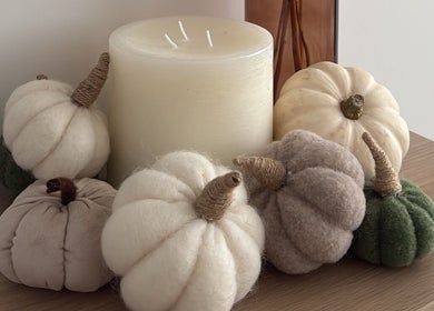 Chic pumpkin decor with candle at Sarah Lawson Beauty, Dalkeith, Scotland, GB.