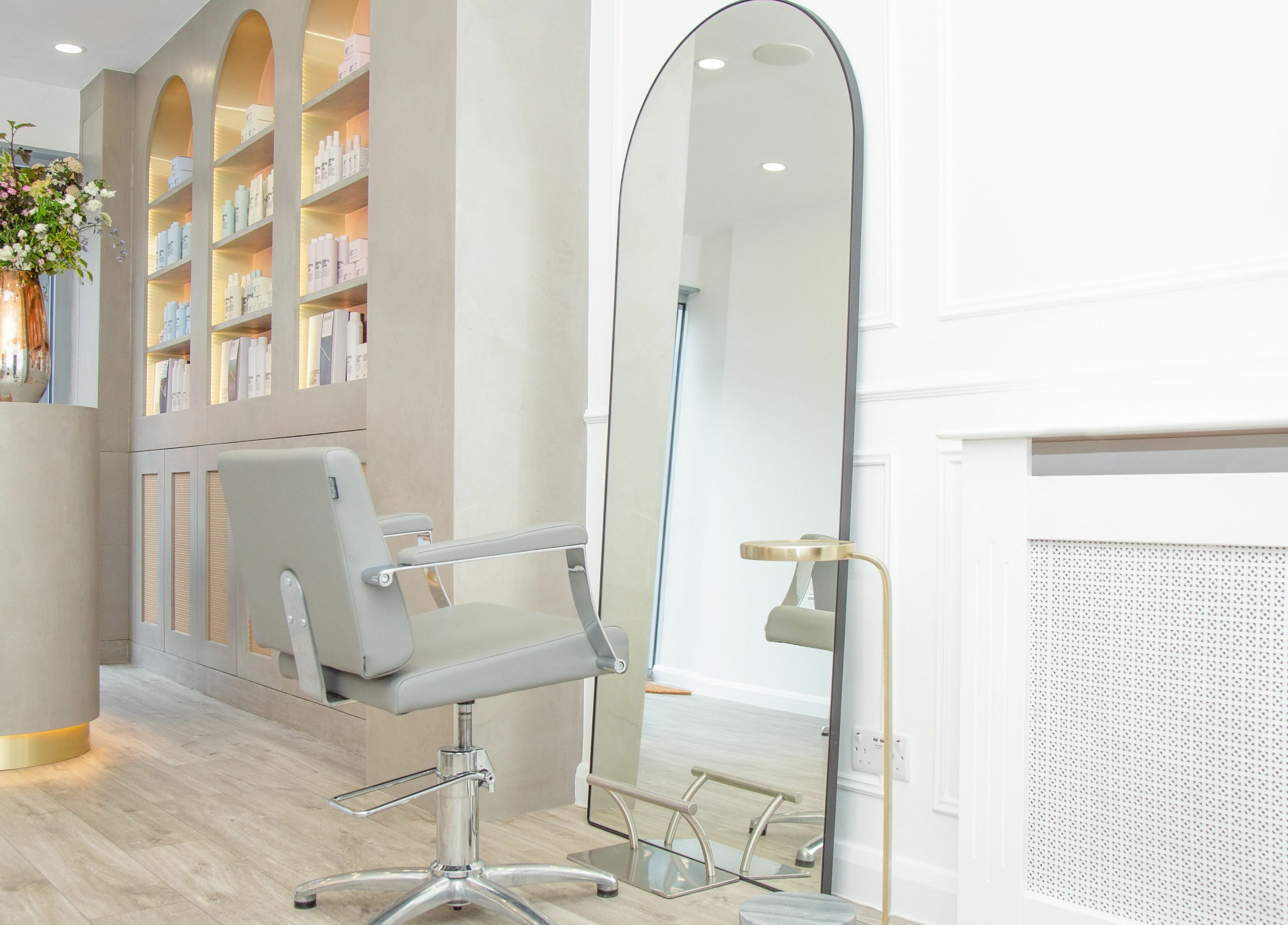 Modern salon chair and mirror at Wavi London, a top beauty venue in London, England, GB.