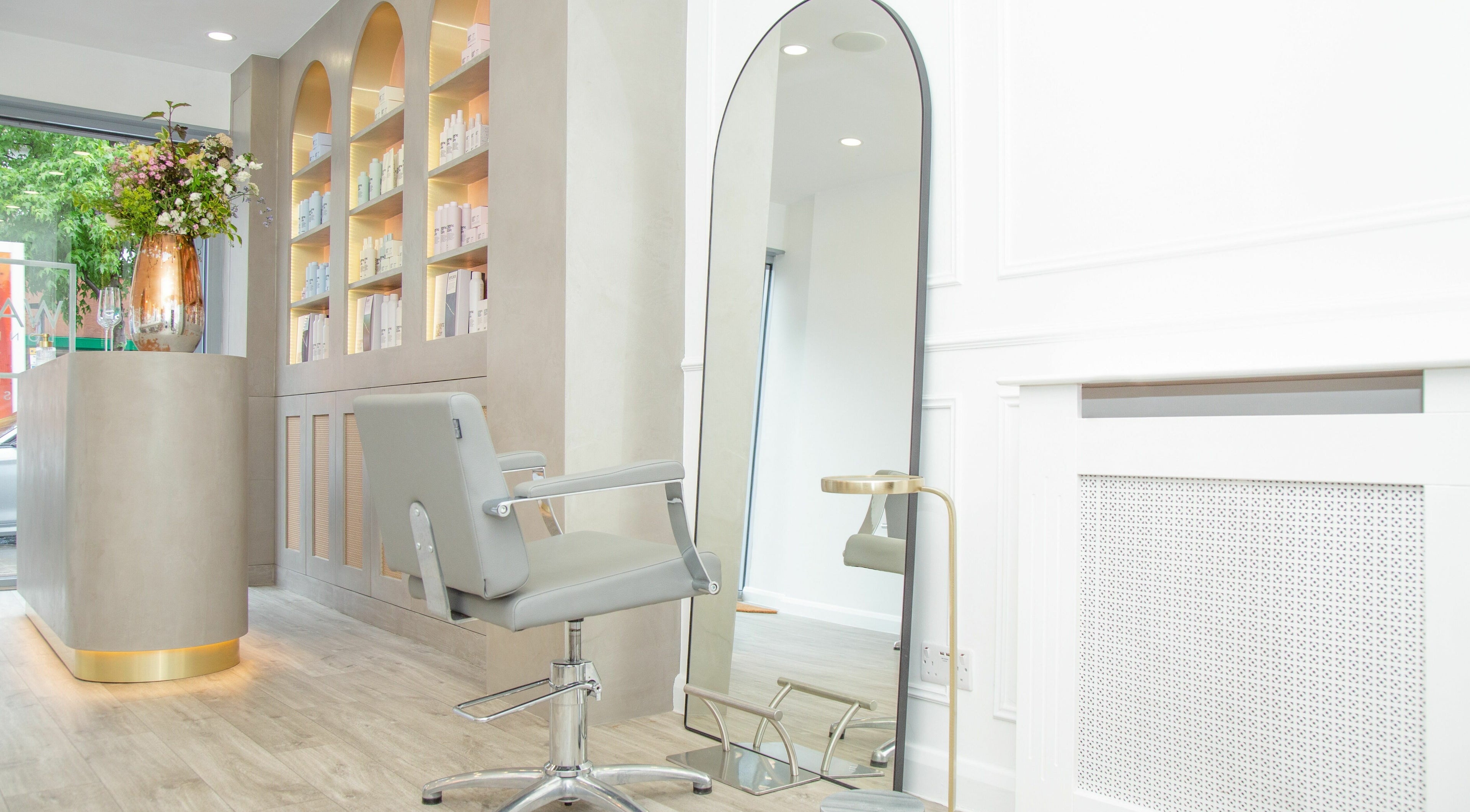 Modern salon chair and mirror at Wavi London, a top beauty venue in London, England, GB.
