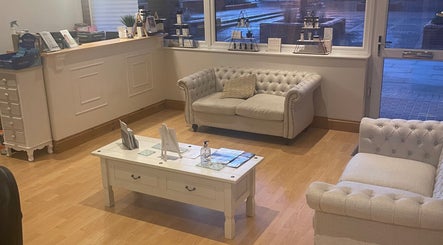 Inviting seating area at Beautevas Beauty and tanning in Martlesham, England, GB.