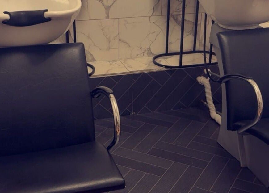 Modern wash stations at Beautevas Beauty and Tanning, Martlesham, England, GB for client comfort.