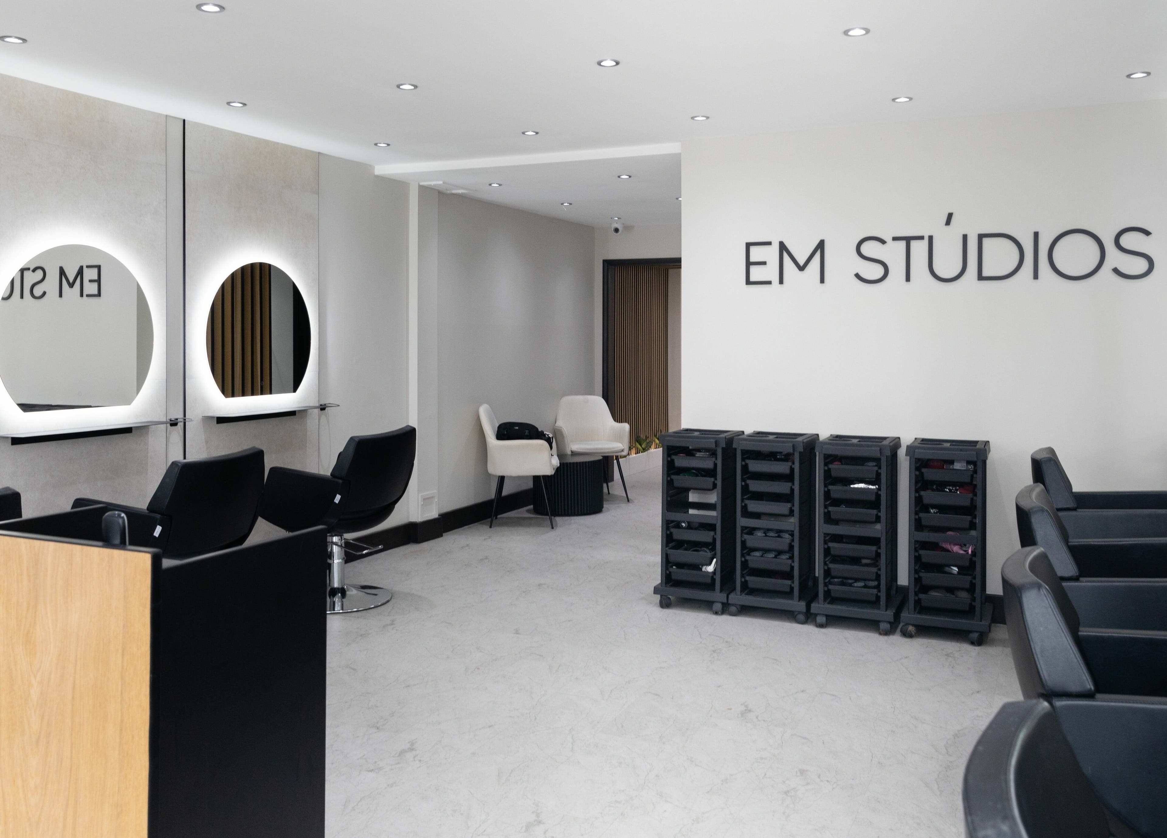 Spacious salon interior at Elizabeth May Studios, Orpington, England, GB with modern styling stations.
