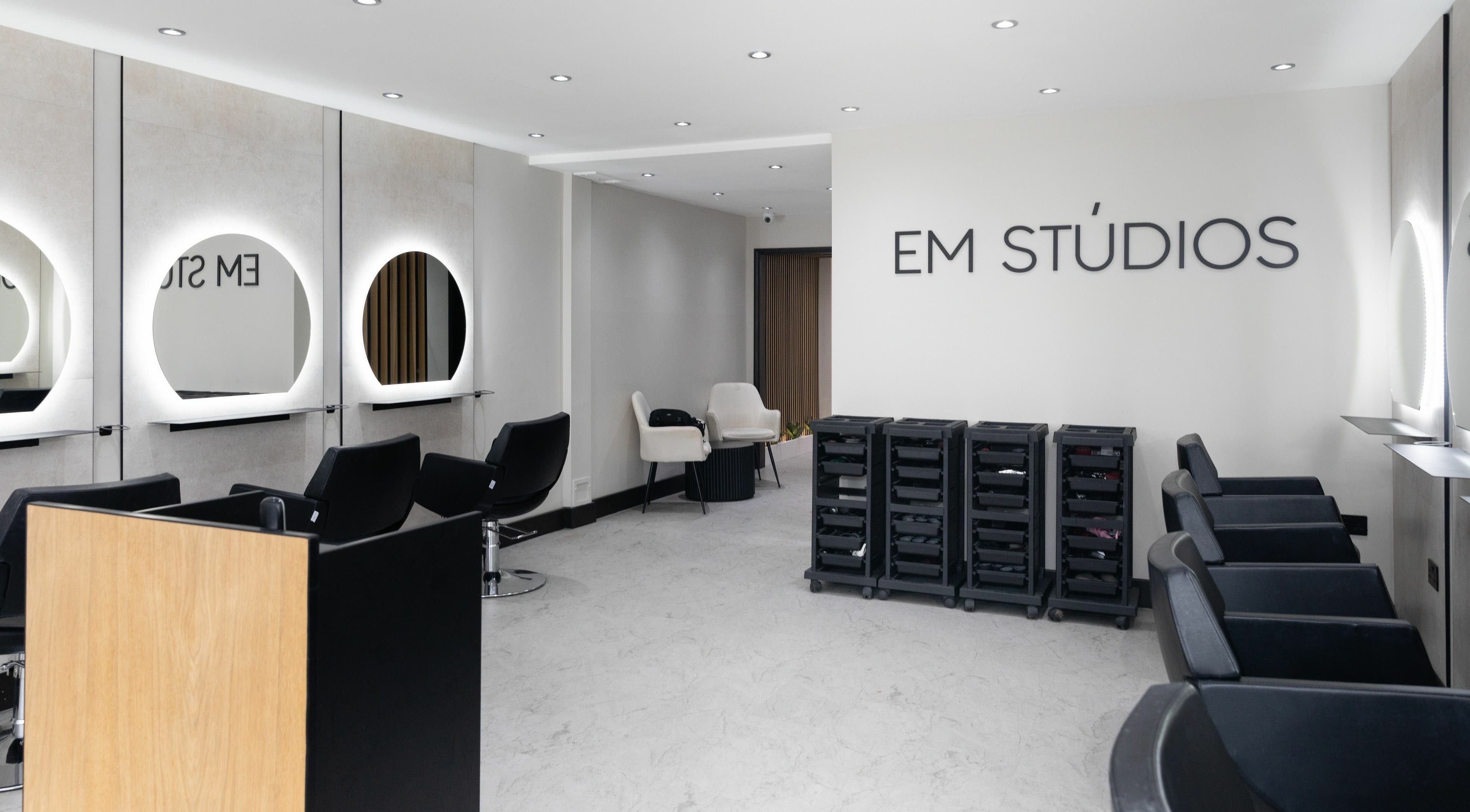 Spacious salon interior at Elizabeth May Studios, Orpington, England, GB with modern styling stations.