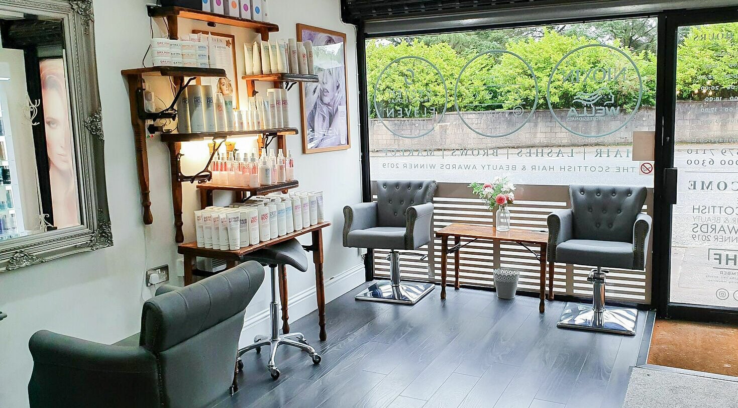 Stylish interior of 110 On Ayr Hair Salon in Glasgow, Scotland, GB, featuring chic decor and hair products.